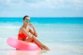 Beautiful woman with inflatable life buoy Royalty Free Stock Photo