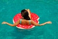 Beautiful woman and inflatable swim ring in shape of donut Royalty Free Stock Photo