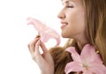 Beautiful woman inhale aroma of lily isolated Royalty Free Stock Photo