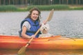 Woman and her dog on a kayak Royalty Free Stock Photo