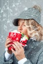 Beautiful woman in knitted hat is drinking hot coffee. Happy holiday Royalty Free Stock Photo