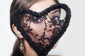 Beautiful woman with lacy heart