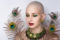 Woman with peacock feathers Royalty Free Stock Photo