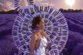 Beautiful woman in lavender field with treble clef and piano throne Royalty Free Stock Photo