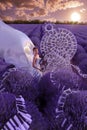 Beautiful woman in lavender field with treble clef and piano throne