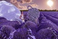 Beautiful woman in lavender field with treble clef and piano throne Royalty Free Stock Photo