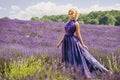 Beautiful woman in lavender fields