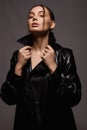 Beautiful woman in leather trench coat. beauty passion brunette girl