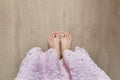 Beautiful Woman Legs and Feet. Close Up Female Barefoot On Wooden Floor Background