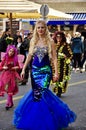 Rijeka, Croatia February 2020.Smiling attractive lady in carnival mask standing on the street during Rijeka carnival, the b