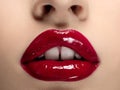 Beautiful woman lips with red lipstick closeup