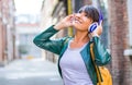 Beautiful woman are listening music with headphone Royalty Free Stock Photo