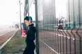 Woman listening to music while working out and jogging outdoor Royalty Free Stock Photo