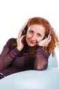 Beautiful woman listning music in headphones Royalty Free Stock Photo