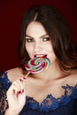 Beautiful woman, Lollipop in hand Royalty Free Stock Photo