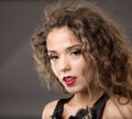 Beautiful woman with long brown hair. Closeup portrait of a fashion model posing at studio. Royalty Free Stock Photo