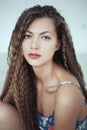 Beautiful woman with long hair in white room Royalty Free Stock Photo