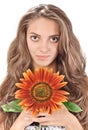 Beautiful woman with long hairs holding sunflower Royalty Free Stock Photo