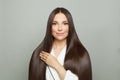 Beautiful woman with long healthy straight hair on white background. Haircare concept Royalty Free Stock Photo