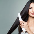 Beautiful Woman with Long Straight Hair Using Hair Straightener Royalty Free Stock Photo