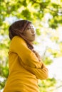 Beautiful woman looking away in park Royalty Free Stock Photo