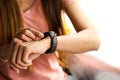 Beautiful woman looking at her smart watch Royalty Free Stock Photo
