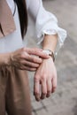 Beautiful woman looking at her watch Royalty Free Stock Photo