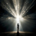 a beautiful woman looking at the light rays from dark background Royalty Free Stock Photo