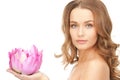 Beautiful woman with lotus flower Royalty Free Stock Photo