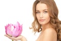 Beautiful woman with lotus flower Royalty Free Stock Photo