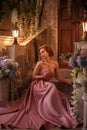 Beautiful woman in a luxurious pink dress Royalty Free Stock Photo