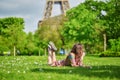 Beautiful woman lying on the grass in Paris Royalty Free Stock Photo