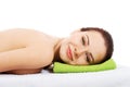 Beautiful woman lying at spa salon. Royalty Free Stock Photo