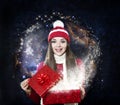 Beautiful woman with magical gift - christmas portrait Royalty Free Stock Photo