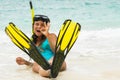 Beautiful young woman after snorkeling on the beach Royalty Free Stock Photo