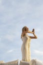 Beautiful Woman Meditating Against Sky Royalty Free Stock Photo