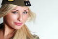 Beautiful woman in military clothes