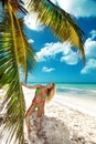 Beautiful woman in a bikini on the beach in the Dominican Republic
