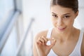 Beautiful Woman Mouth Holding Pill For Teeth. Girl Taking Vitamins Royalty Free Stock Photo