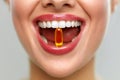 Beautiful Woman Mouth With Pill In Teeth. Girl Taking Vitamins