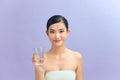 Beautiful woman with naked shoulders drinking a glass of water Royalty Free Stock Photo