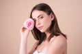 Beautiful woman with natural makeup and rose flowers. Inspiration of spring and summer. Perfume cosmetics concept. Close Royalty Free Stock Photo