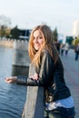 Beautiful woman near fence Royalty Free Stock Photo