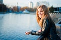 Beautiful woman near fence Royalty Free Stock Photo