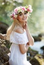 Beautiful woman near a mountain river Royalty Free Stock Photo