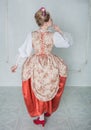 Beautiful woman in old historic medieval dress. Back pose Royalty Free Stock Photo