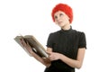 Beautiful woman, orange wig reading old book