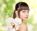 Beautiful woman with orchid flower and butterflies Royalty Free Stock Photo