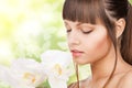 Beautiful woman with orchid flower and butterflies Royalty Free Stock Photo