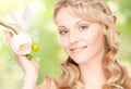 Beautiful woman with orchid flower and butterflies Royalty Free Stock Photo
